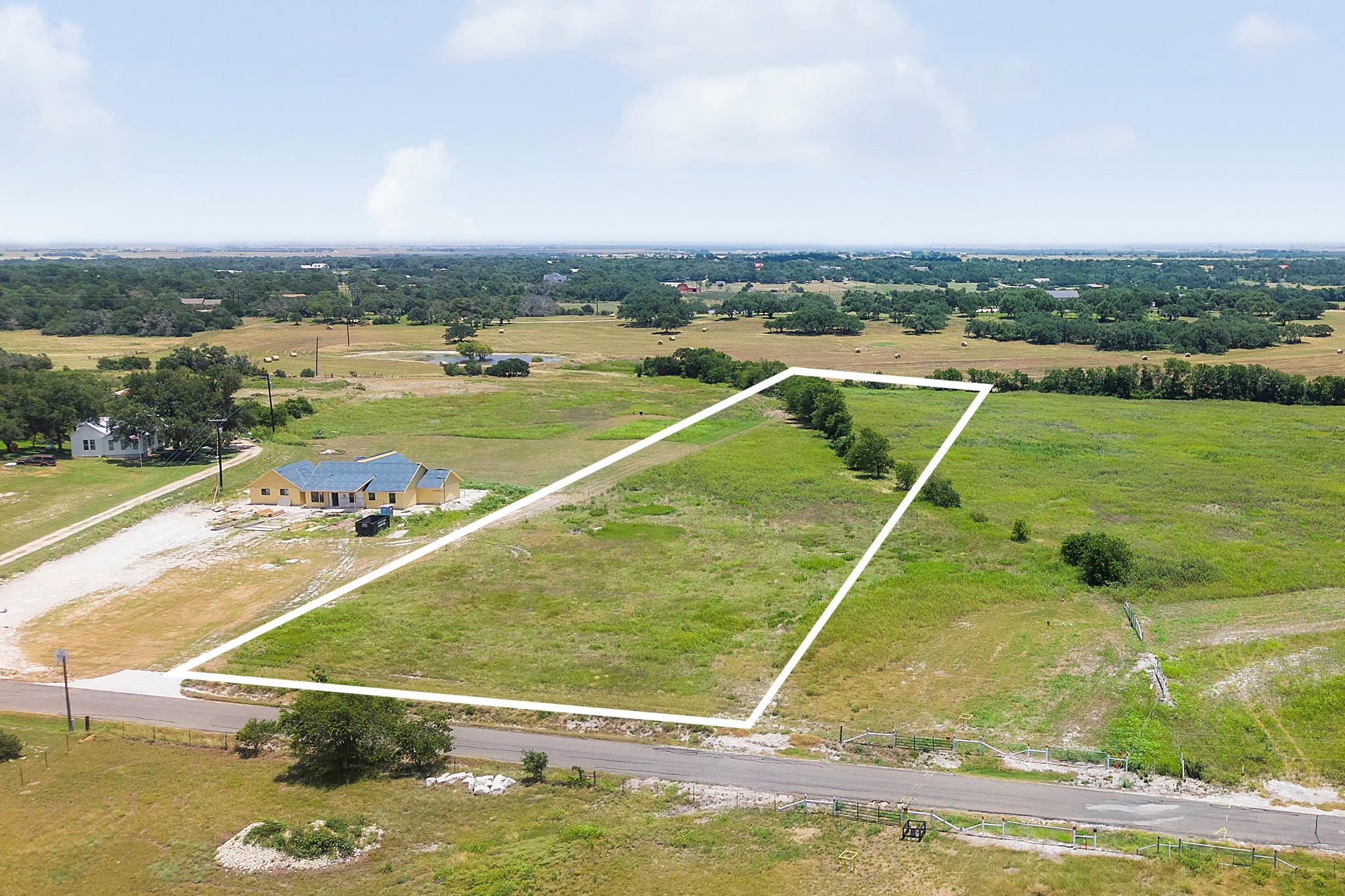 A spacious, buildable rural lot awaits your custo