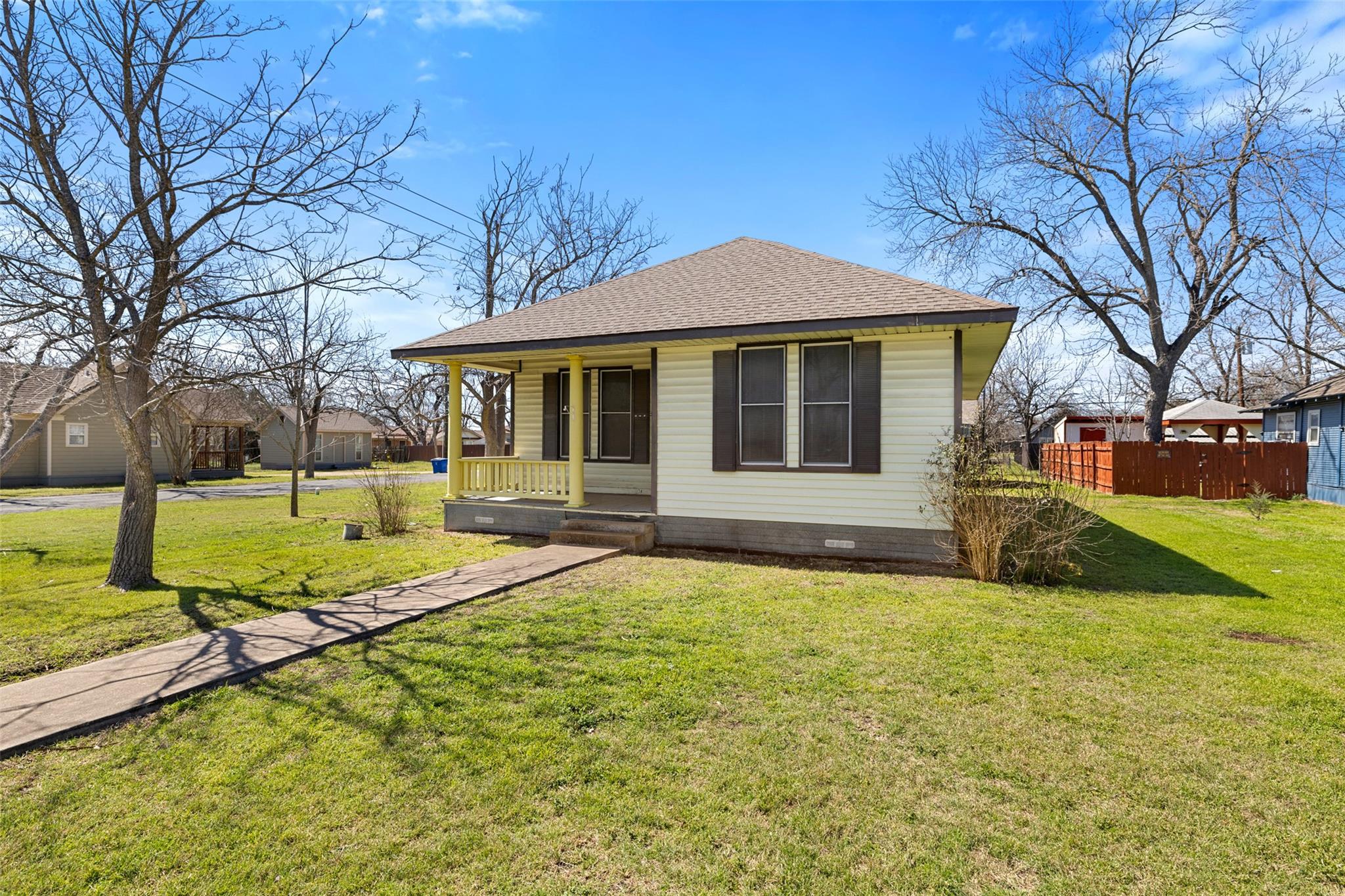 Bungalow-style house with a porch, a shingled roo