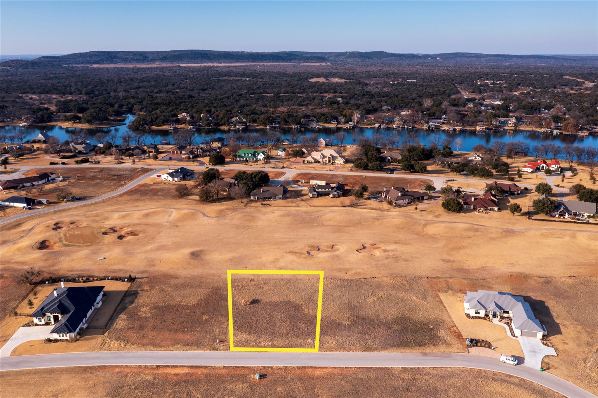 Aerial view of residential area featuring a nearb
