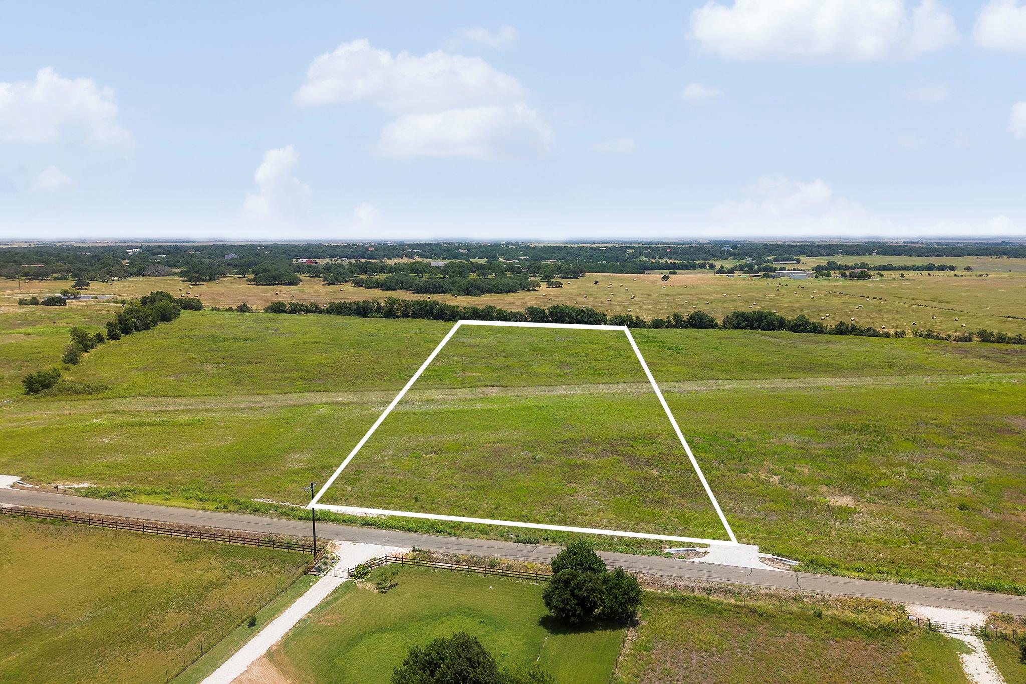 A pristine, expansive lot awaits your architectur
