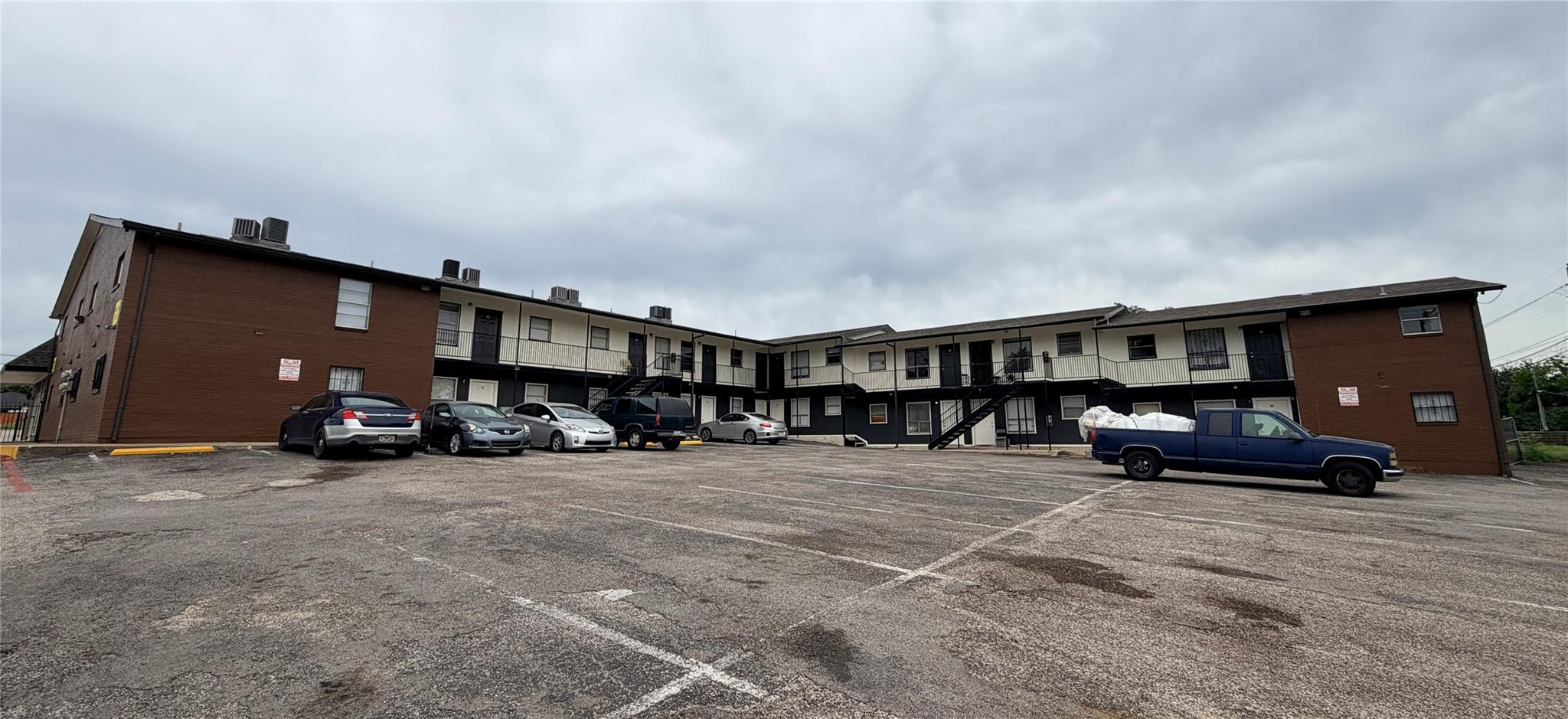 A classic brick exterior apartment complex, offer
