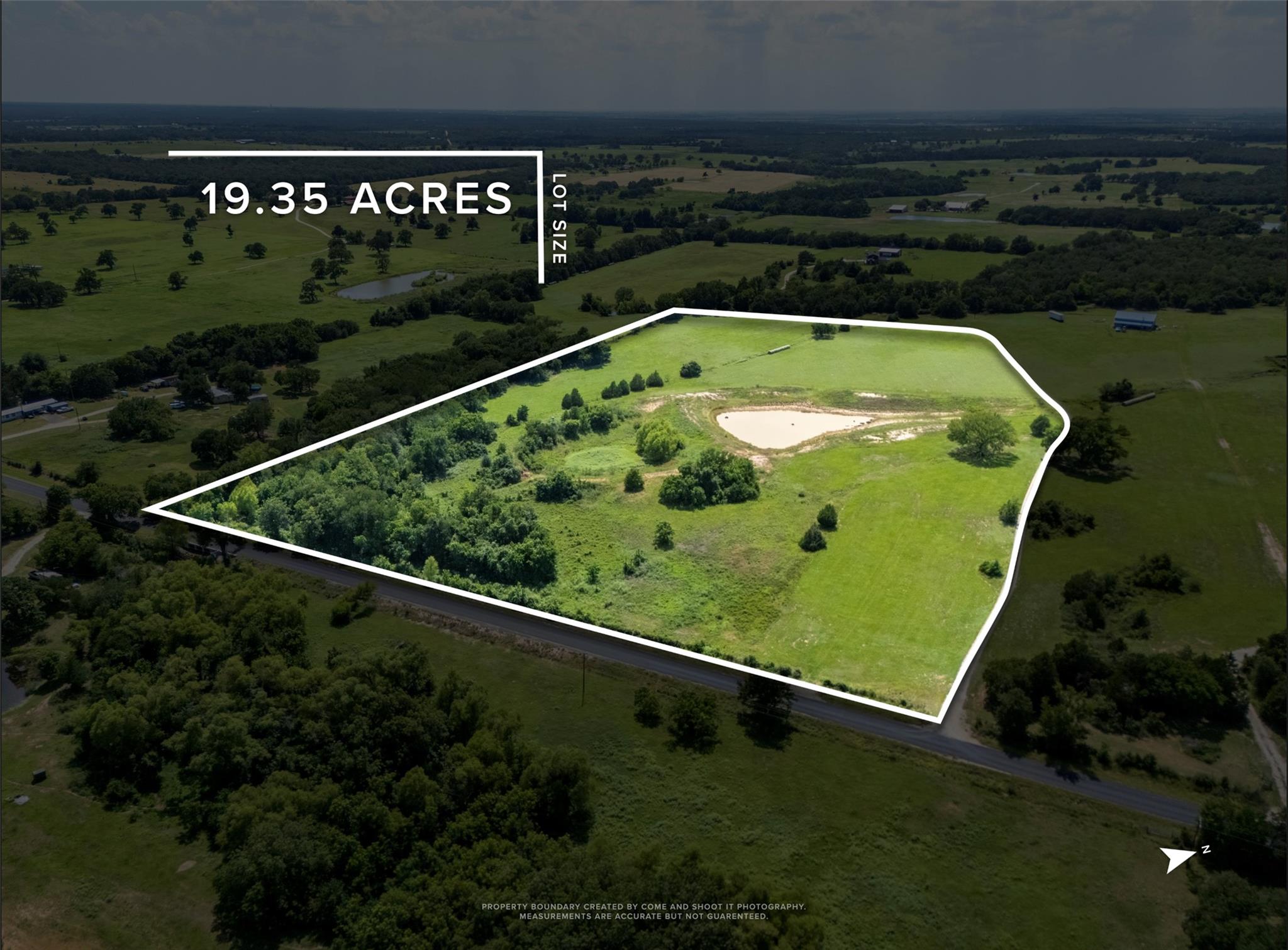 Overview of rural landscape featuring property bo