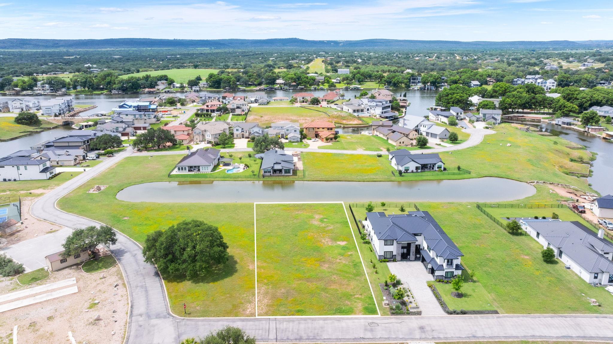 An aerial perspective reveals a prime vacant lot 