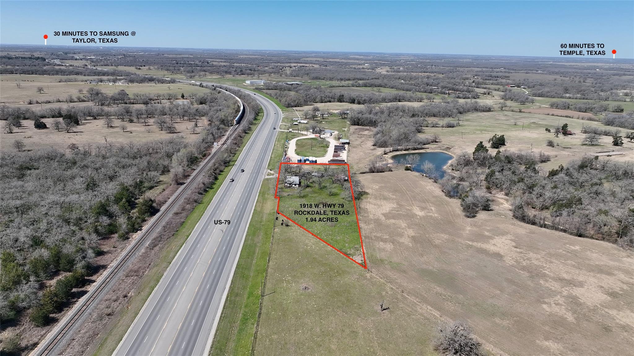Birds eye view of property featuring a rural view