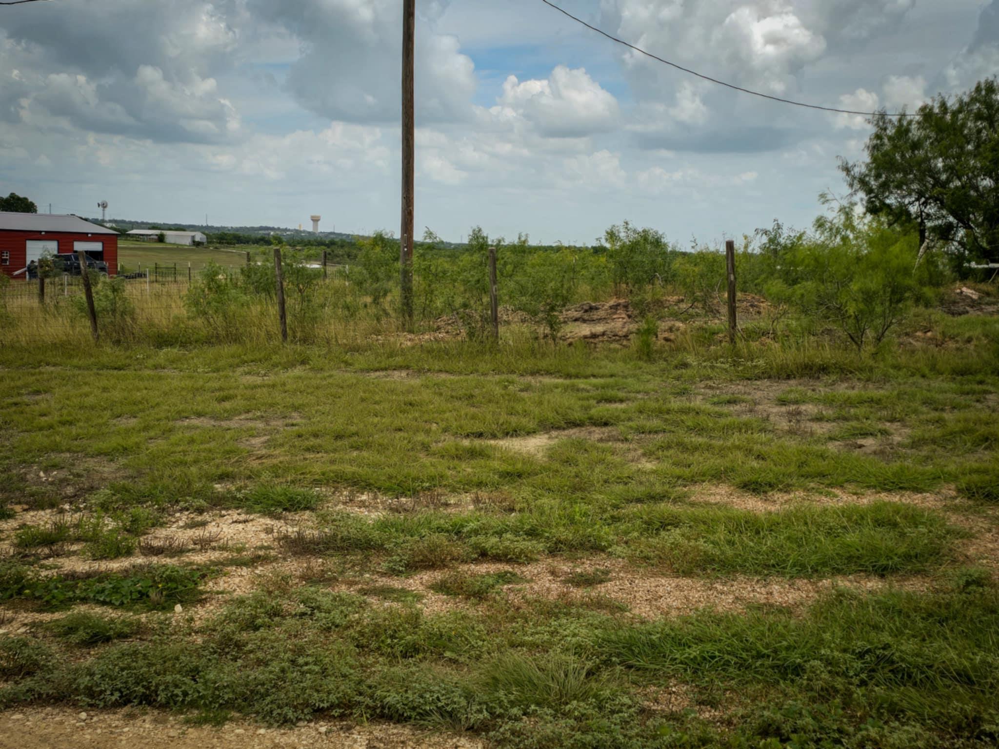 View of yard with a view of countryside