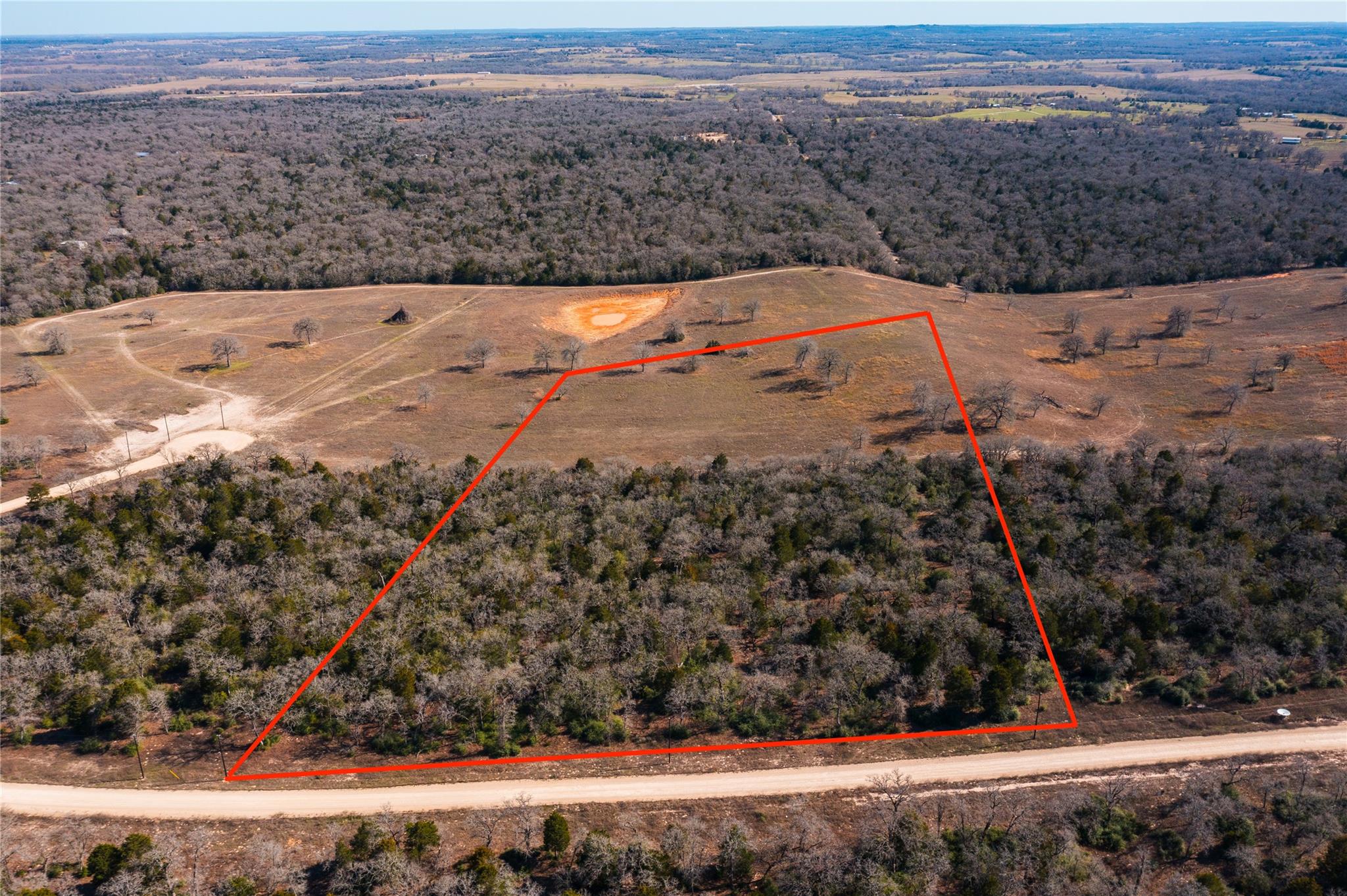 Aerial view with a wooded view