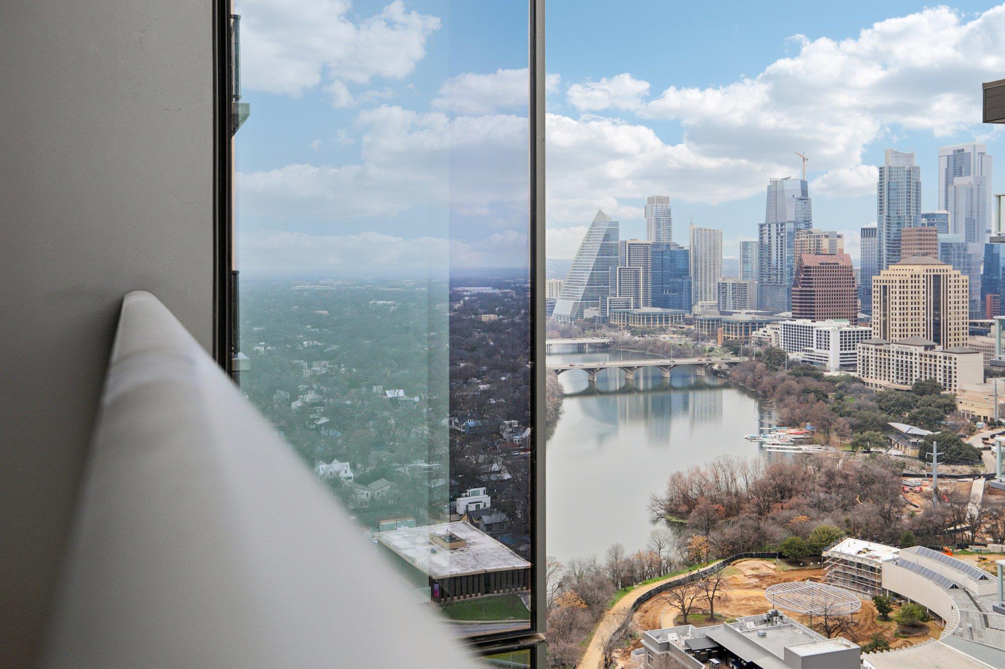 View of city with a water view