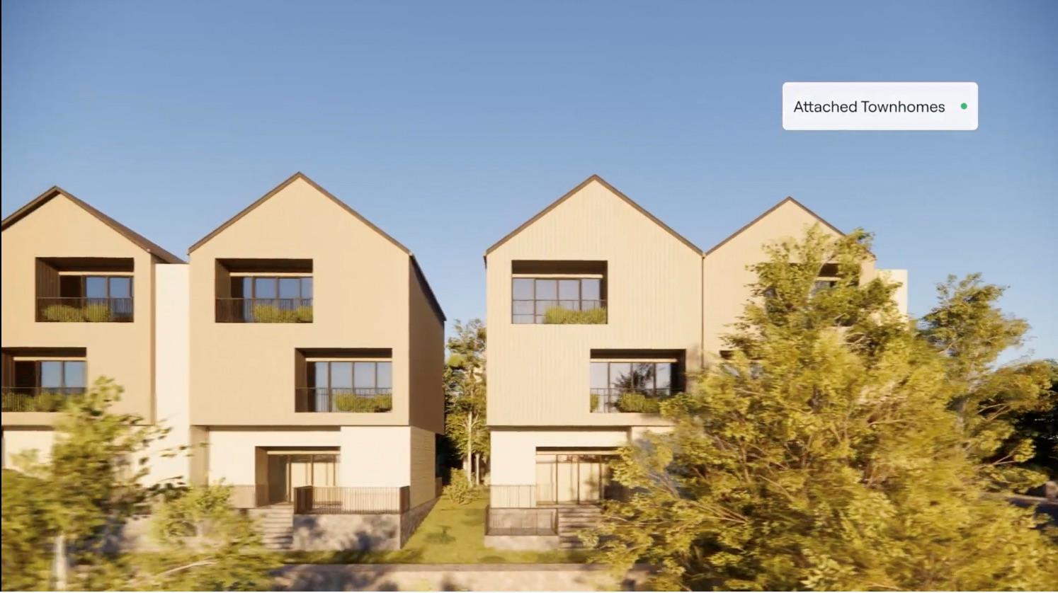 Rear view of property featuring stucco siding