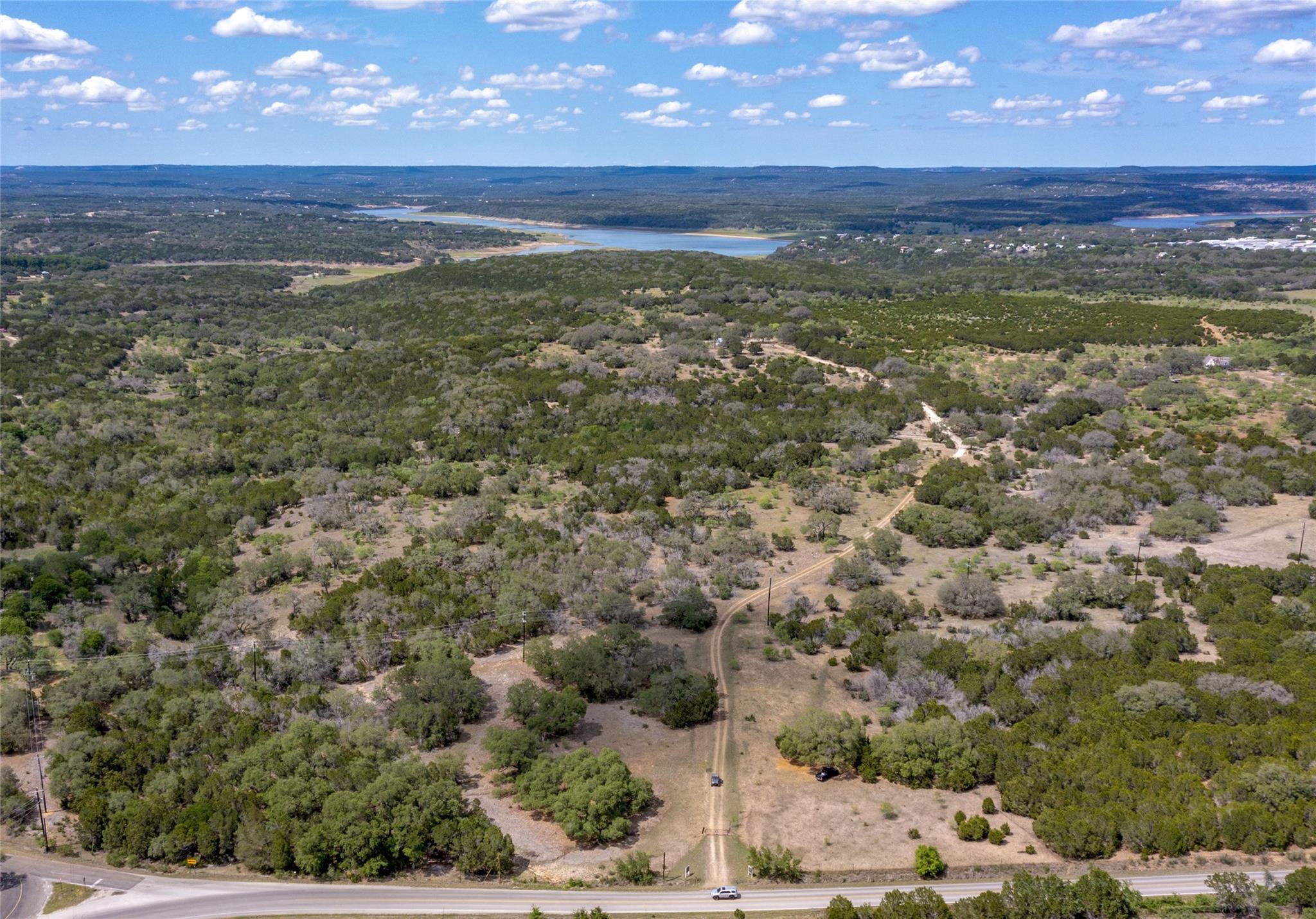 Bird's eye view of a nearby body of water and a f