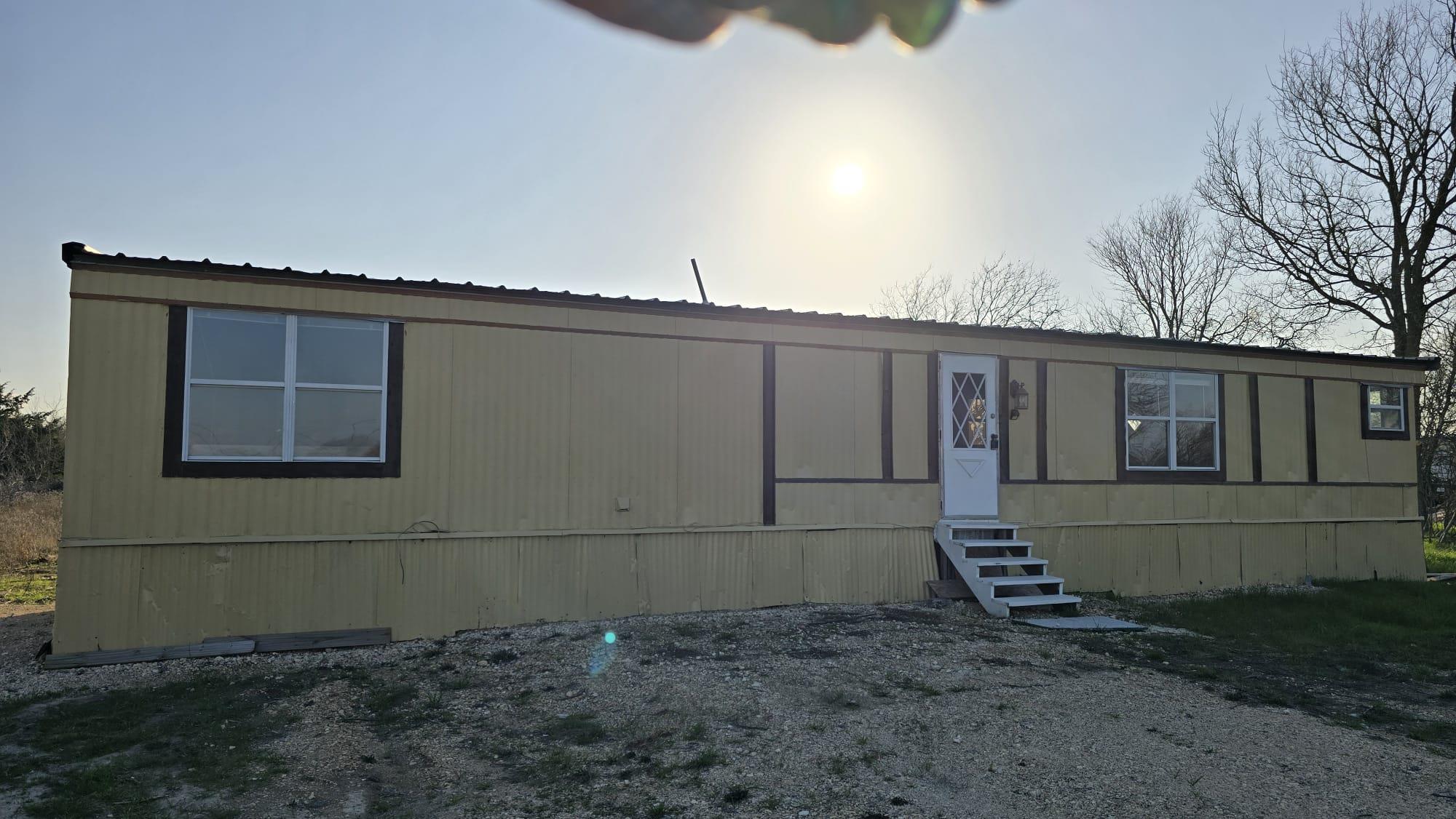 Manufactured / mobile home featuring entry steps