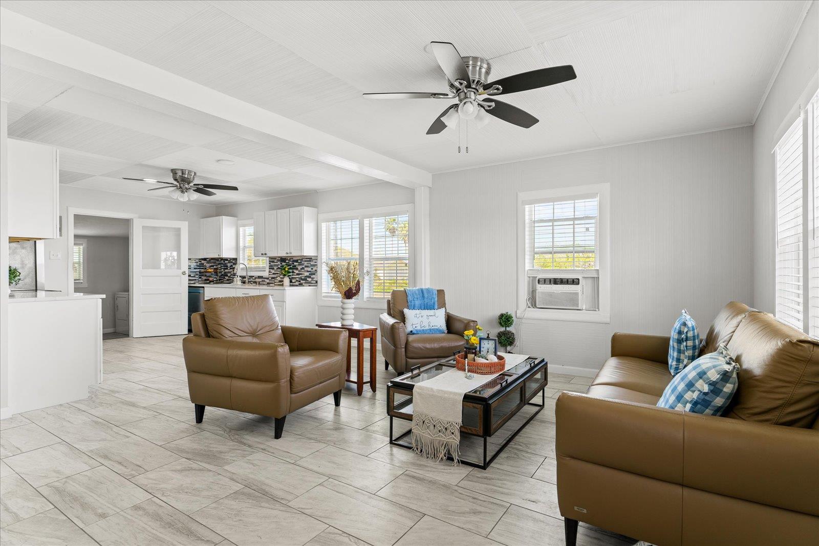 Living room featuring ceiling fan