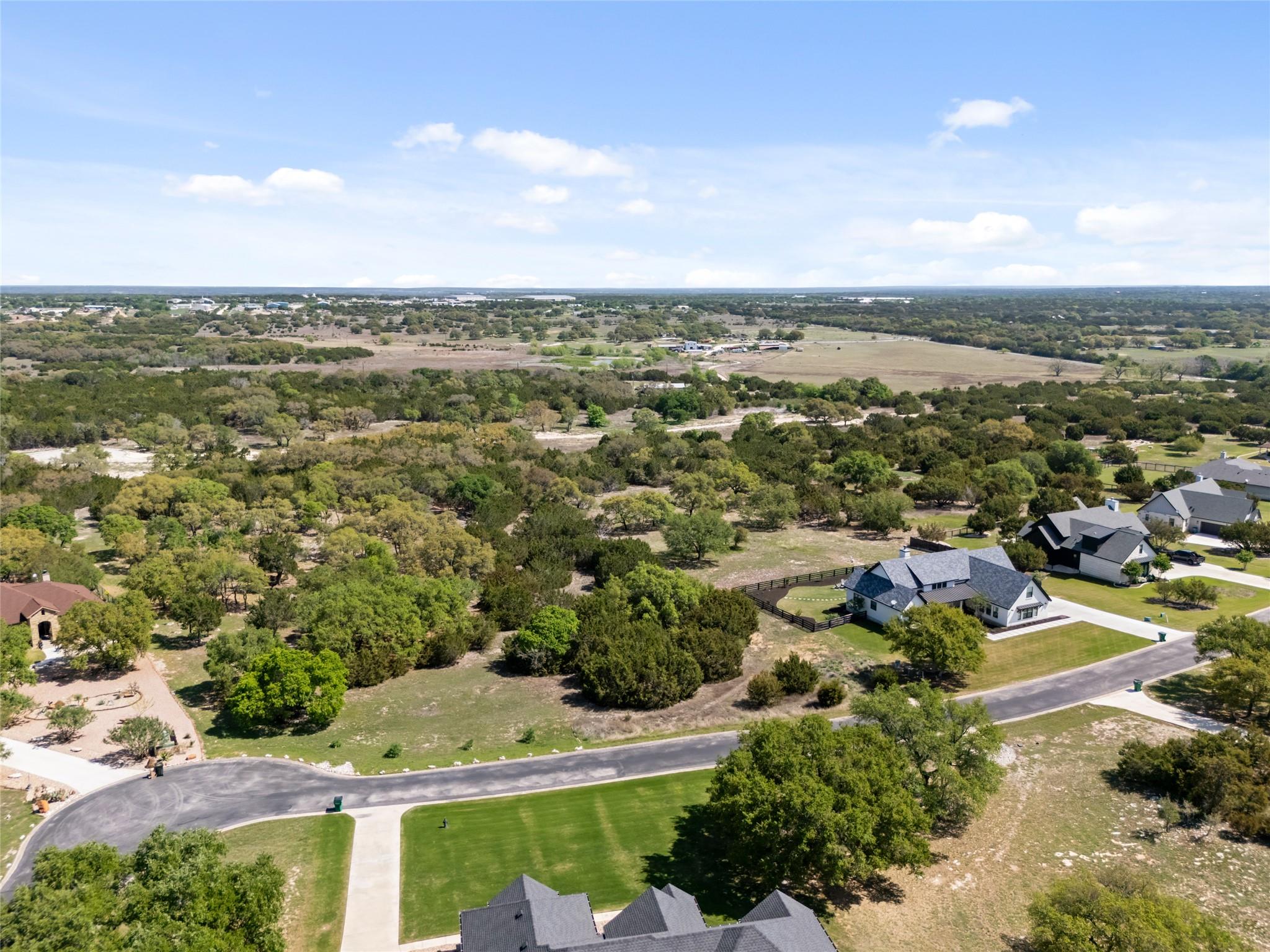 Birds eye view of property with a residential view