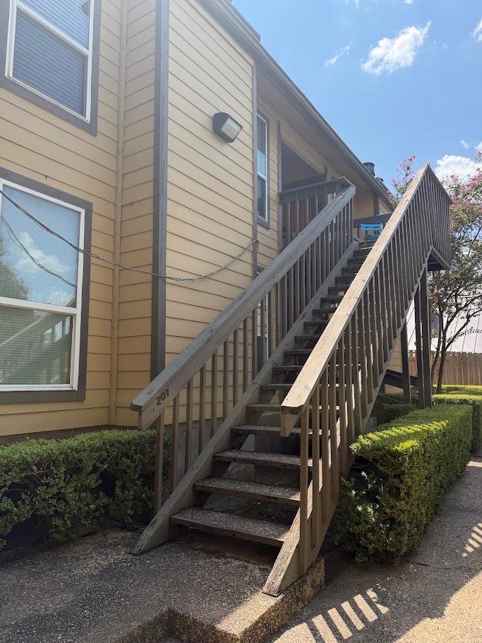 A classic exterior with wood siding and a sturdy 