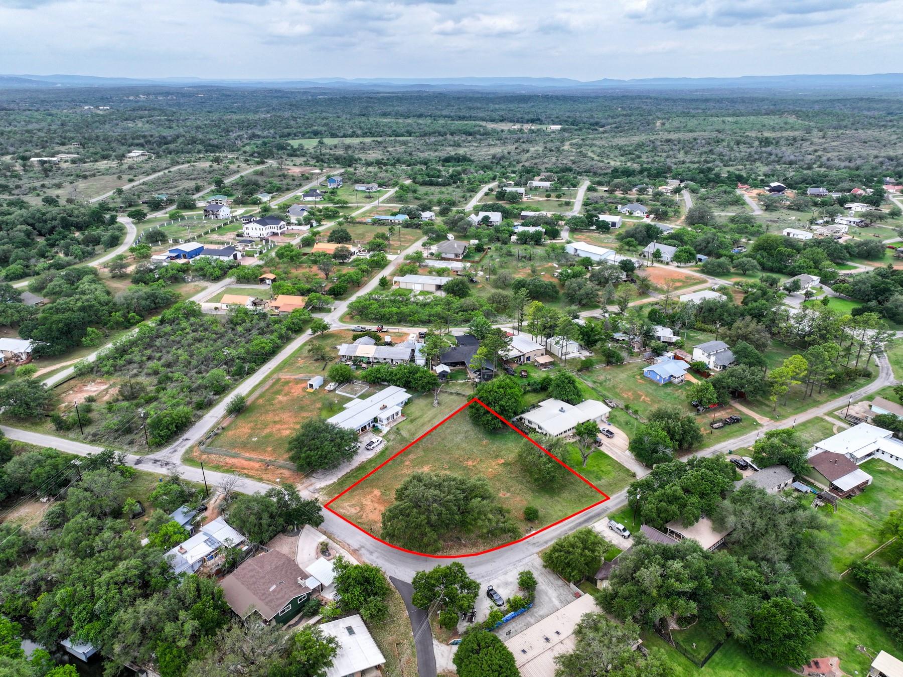 Birds eye view of property with a residential view