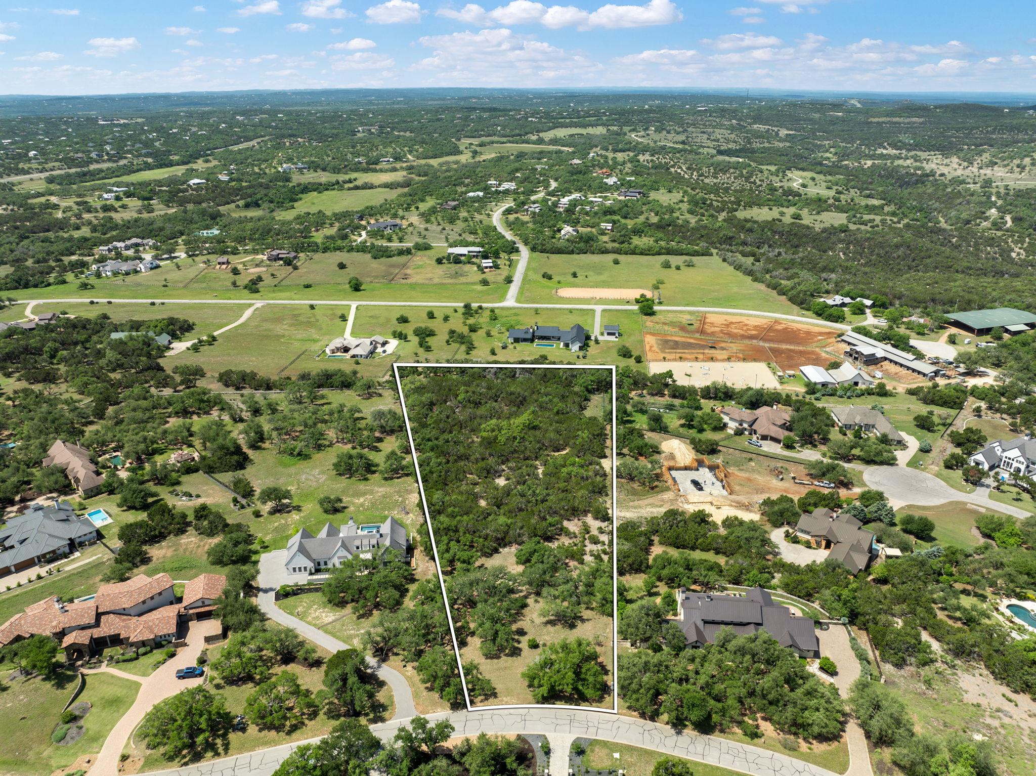 Aerial perspective of suburban area with property