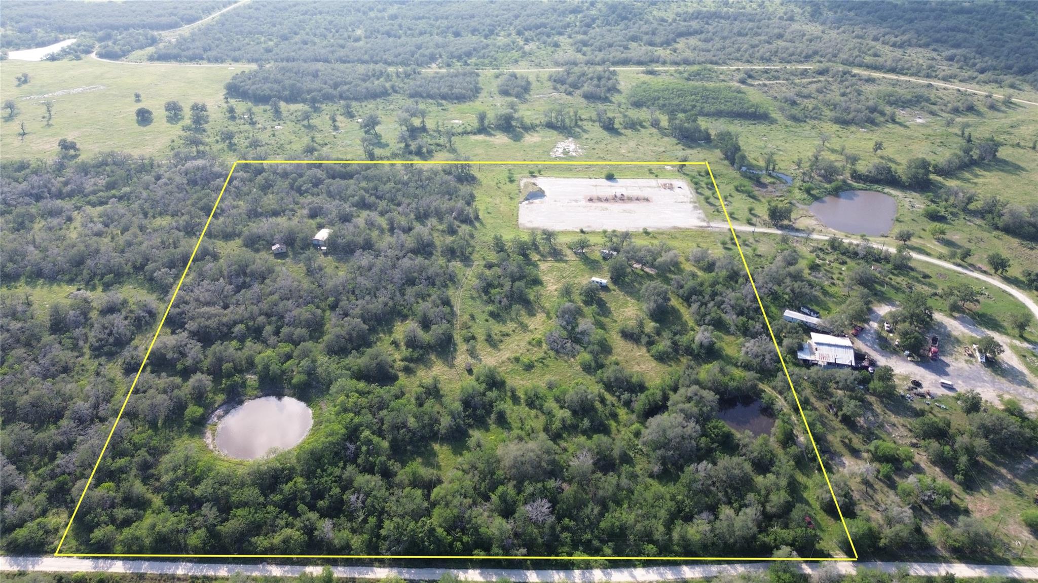 Expansive acreage featuring abundant mature trees