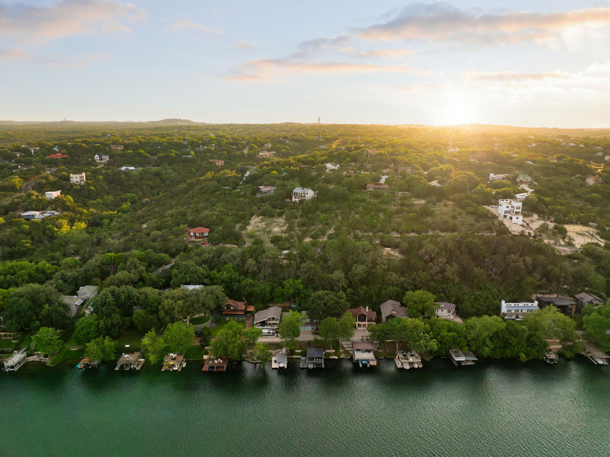 Aerial view of a large body of water and a heavil