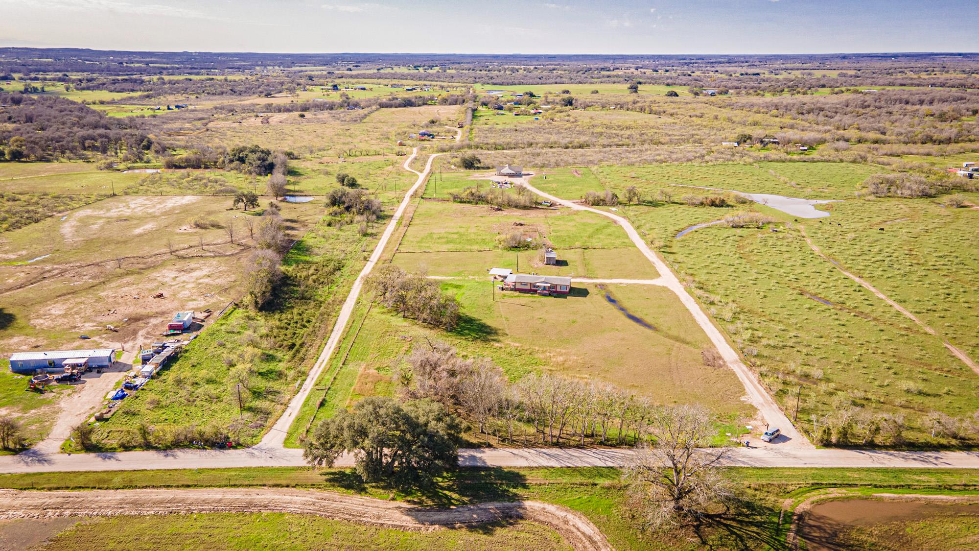 Aerial view of property and surrounding area feat