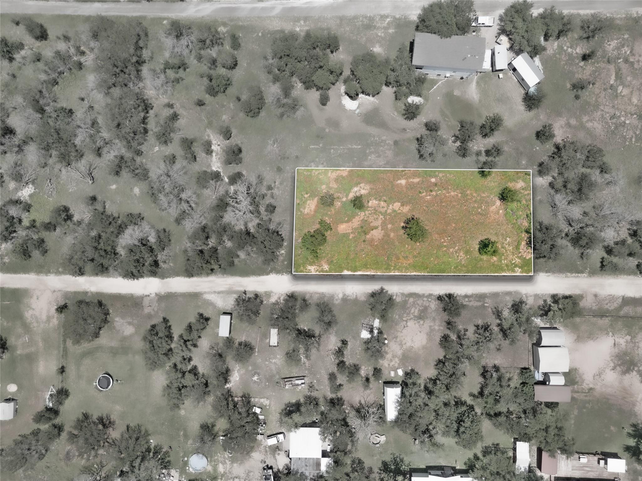Aerial overview of property's location with prope