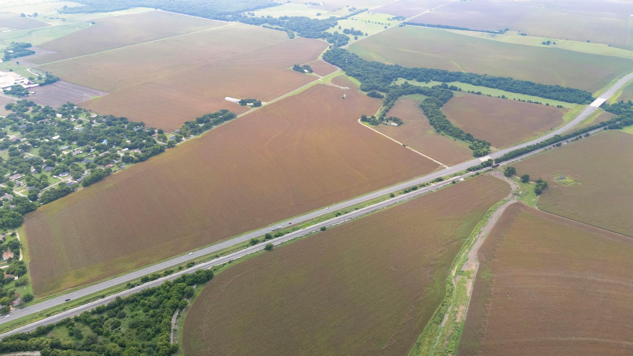 Overview of rural landscape featuring farmland