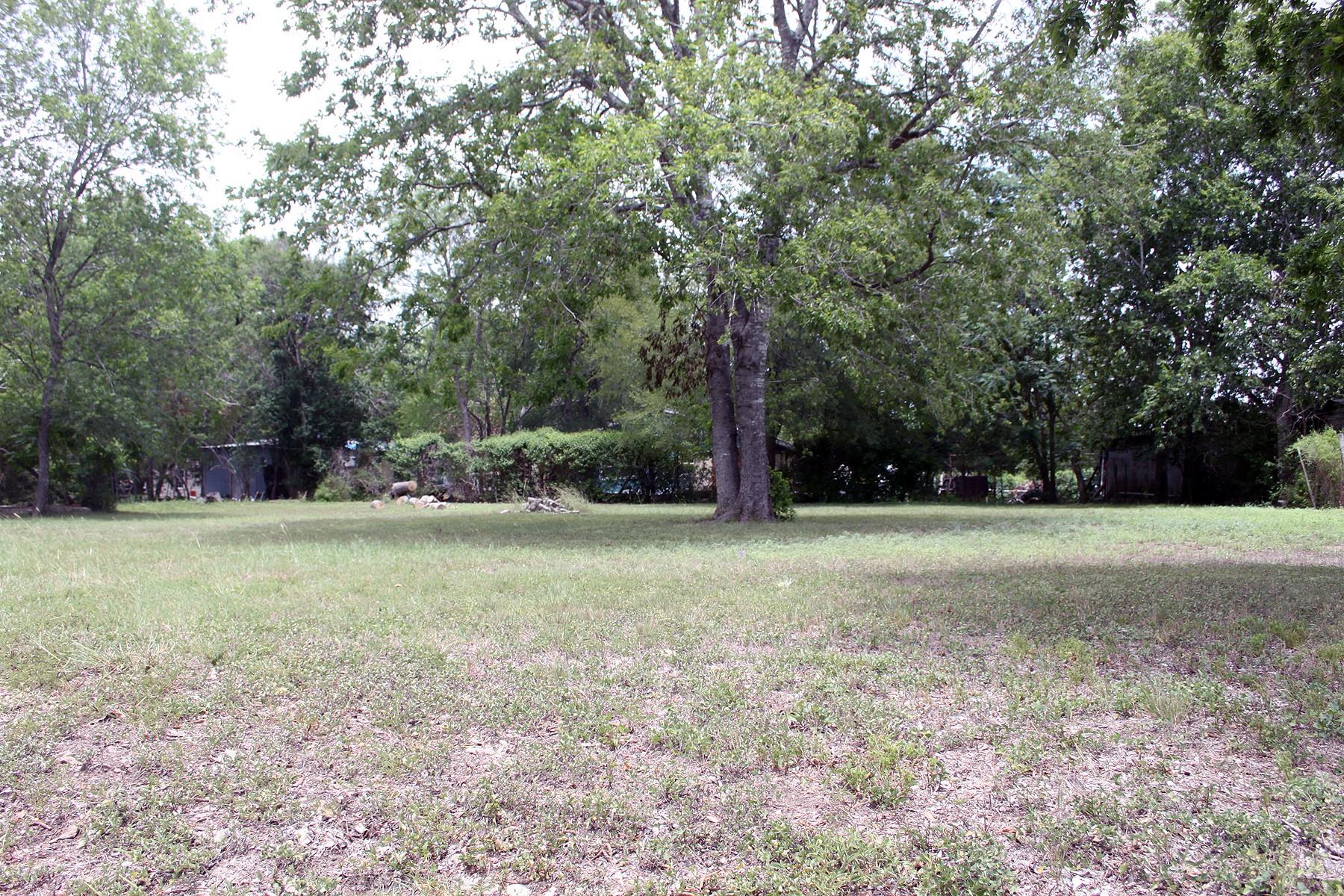 View of yard with view of wooded area
