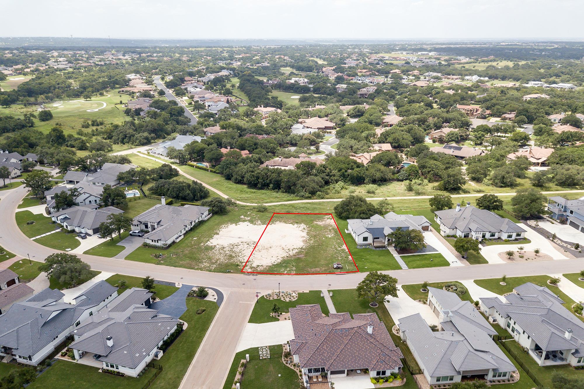 Aerial view of residential area with property bou