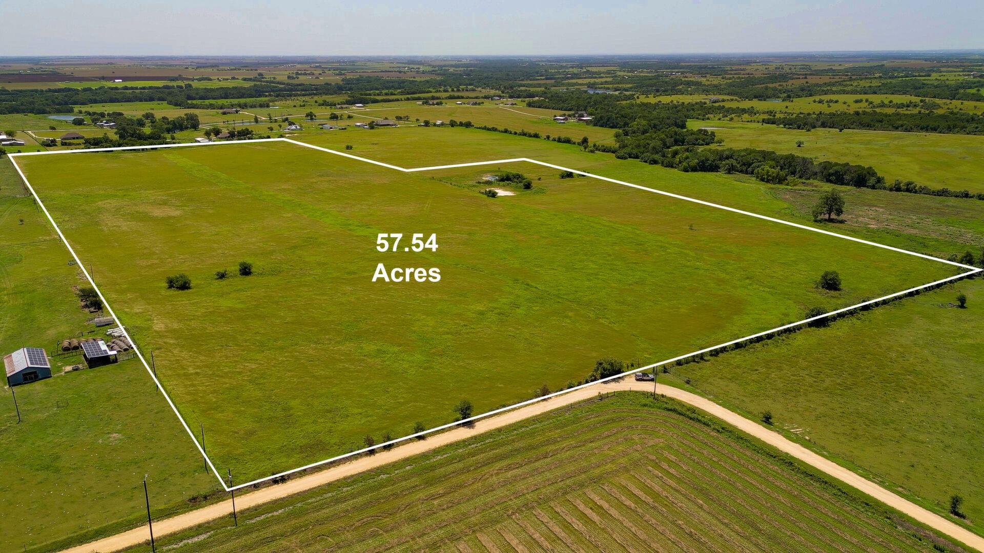 Overview of rural landscape featuring property bo