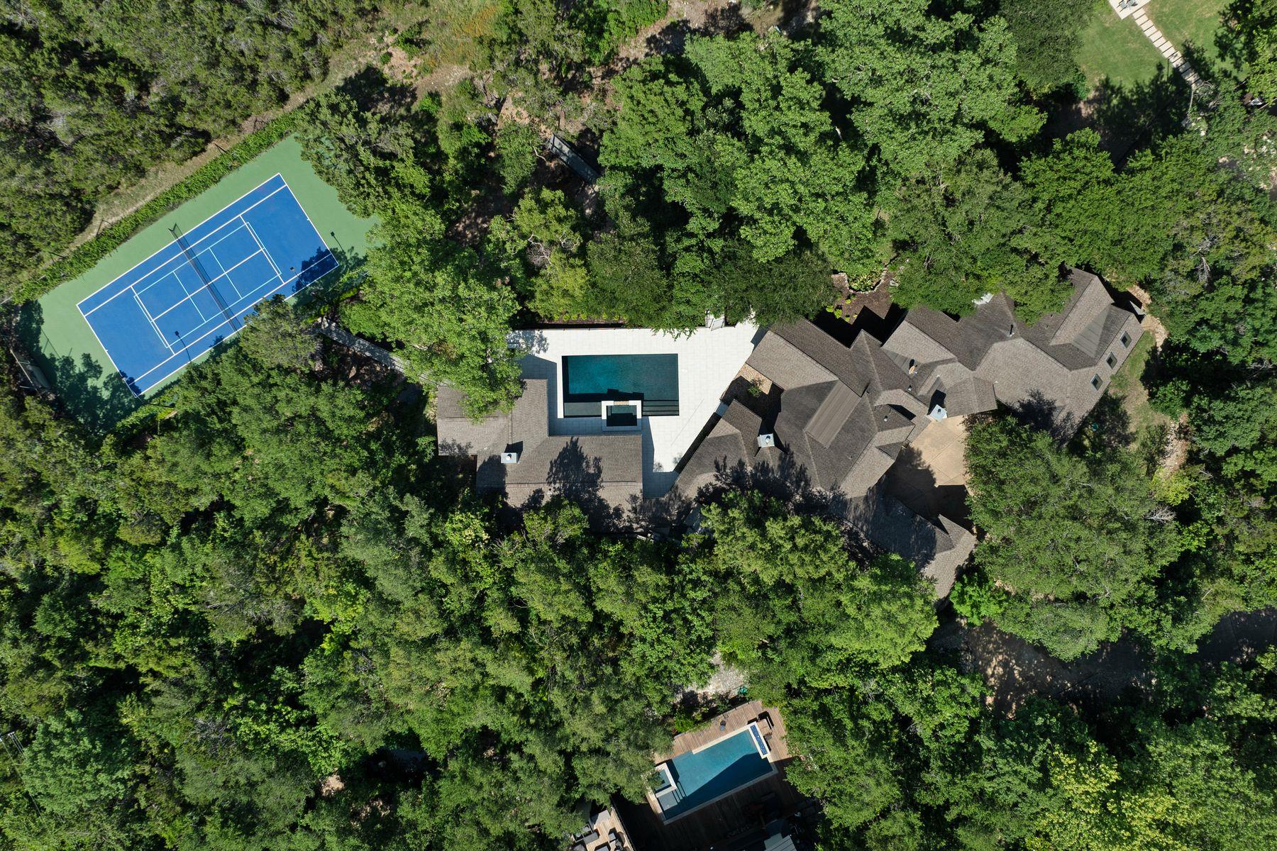 Drone / aerial view of a tree filled landscape