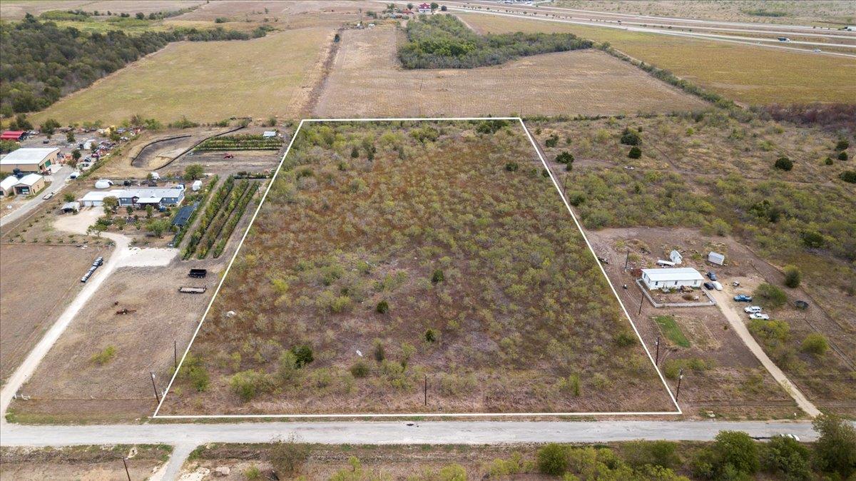 Aerial view of sparsely populated area with prope