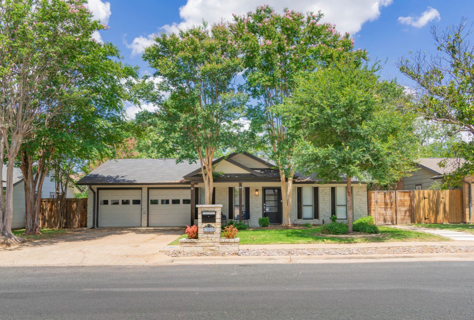 Listing photo 1 of 7002  Whispering Oaks Dr