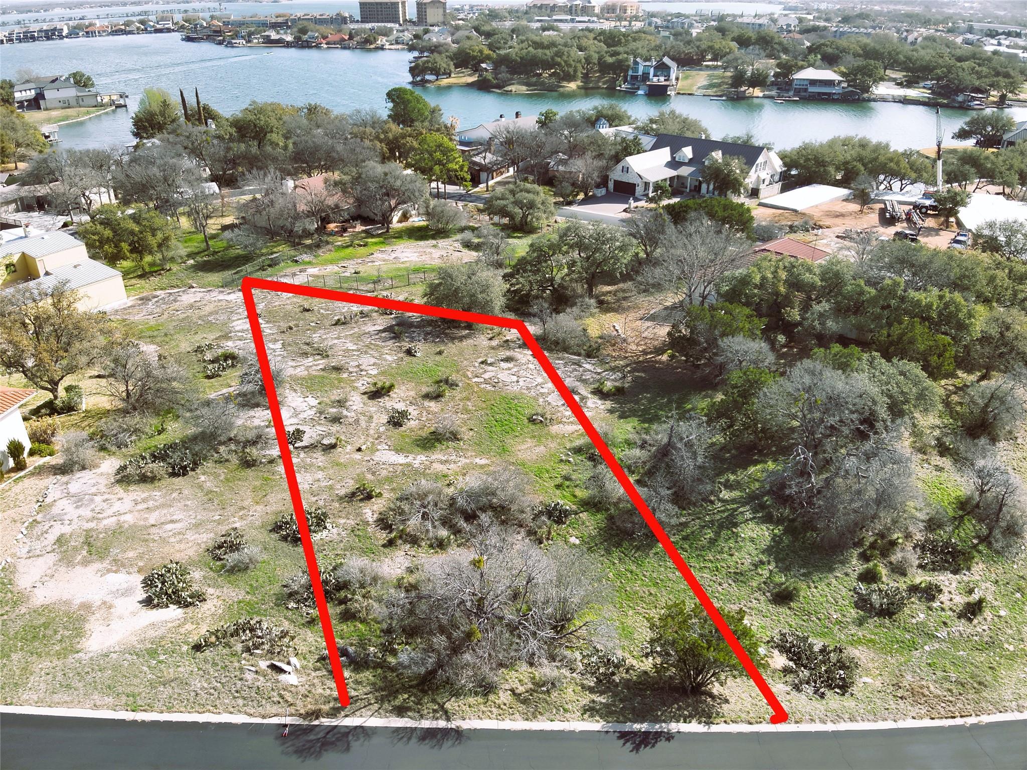 Aerial overview of property's location with a lar