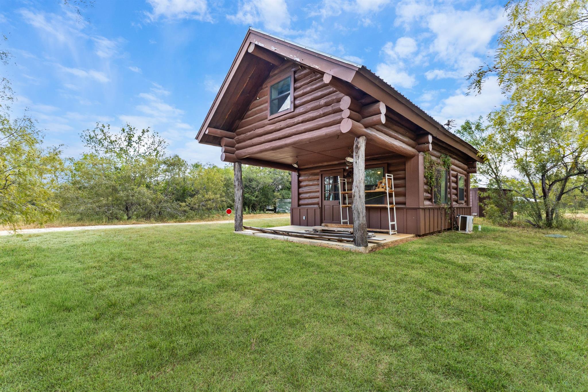 View of front of house featuring a front yard and
