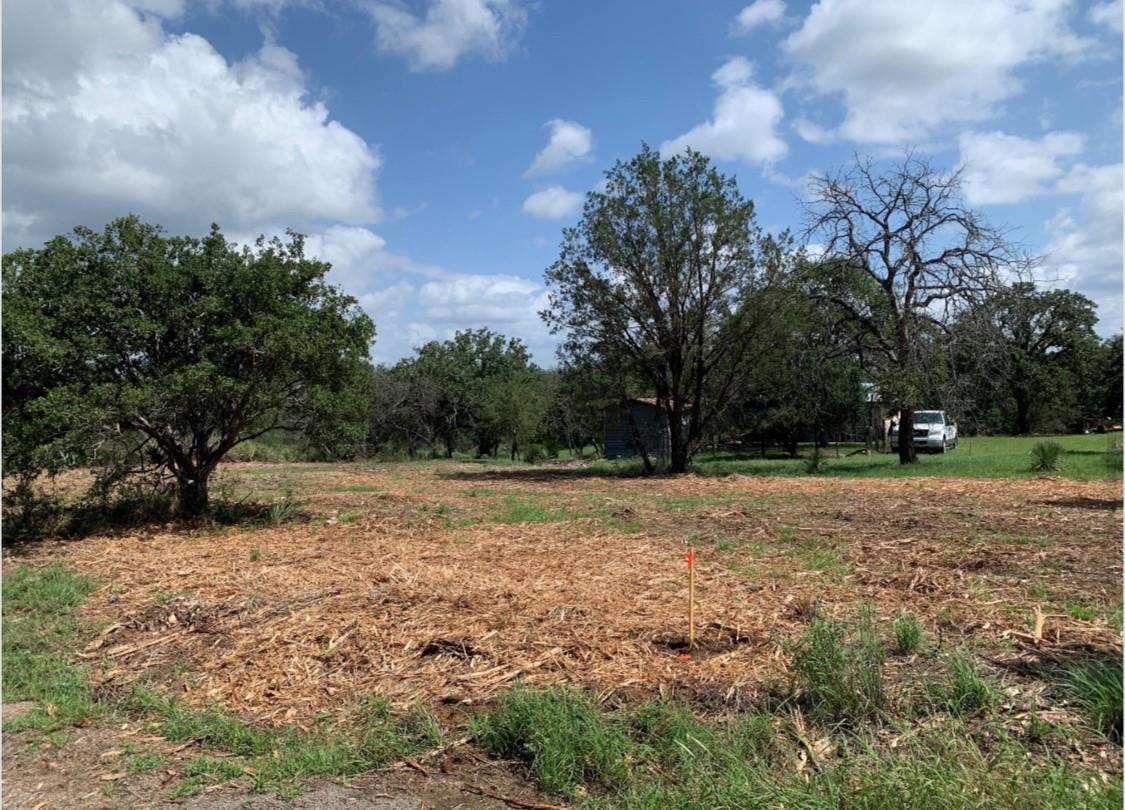 View of yard with a rural view