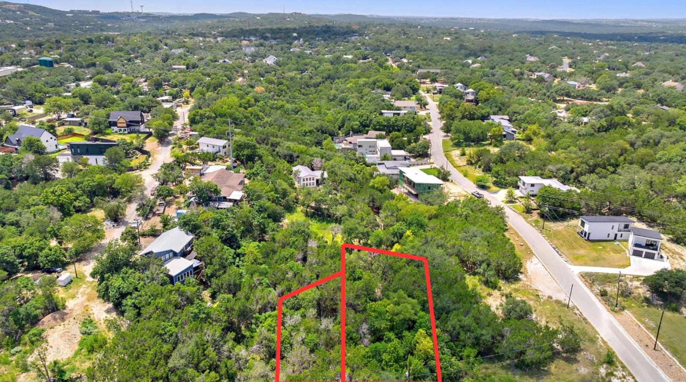 Aerial perspective of suburban area with property