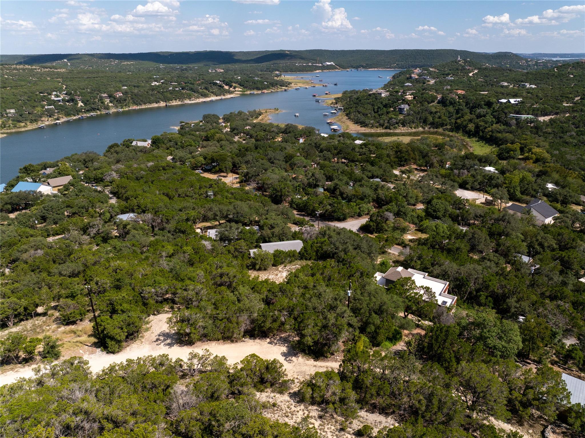 Aerial overview of property's location with a lar