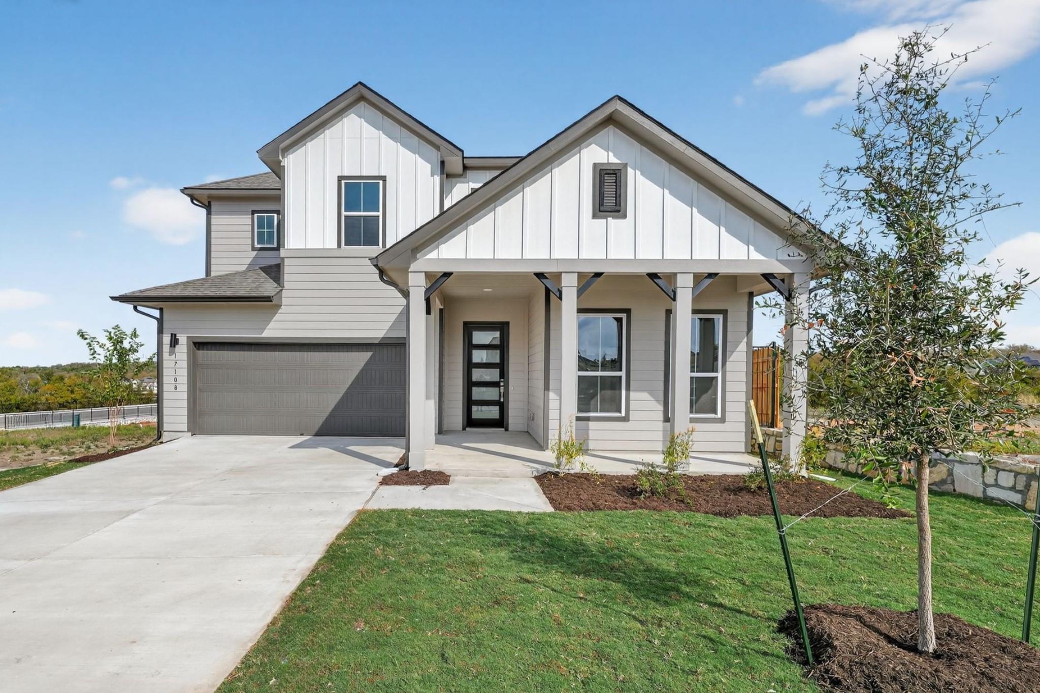 Modern farmhouse style home featuring board and b