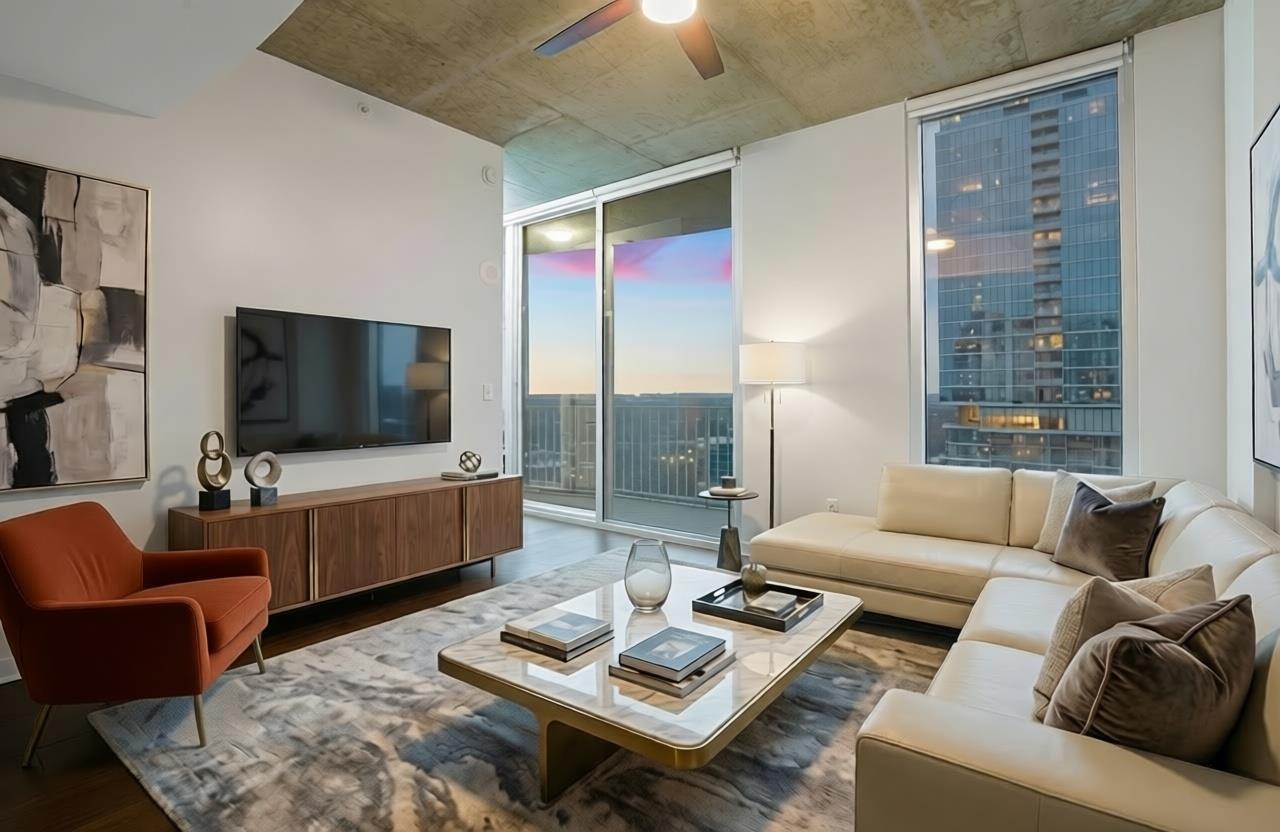 Living room featuring wood finished floors, expan