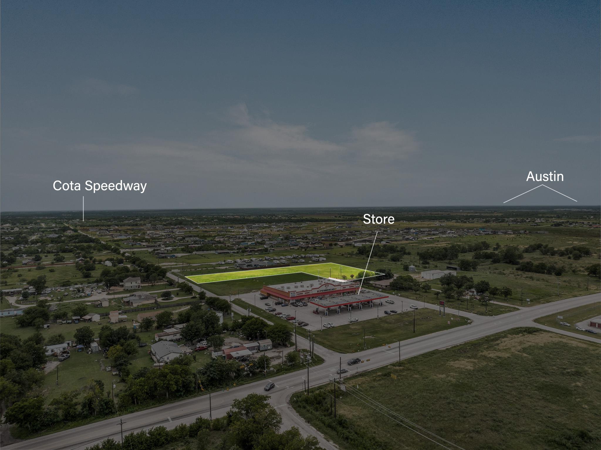 Aerial overview of property's location with prope