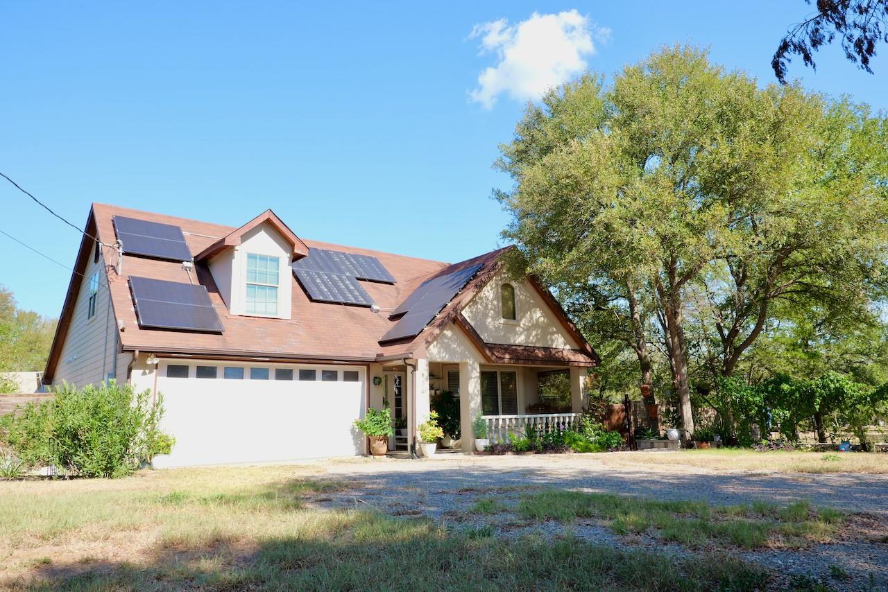 View of front of property with covered porch, sol