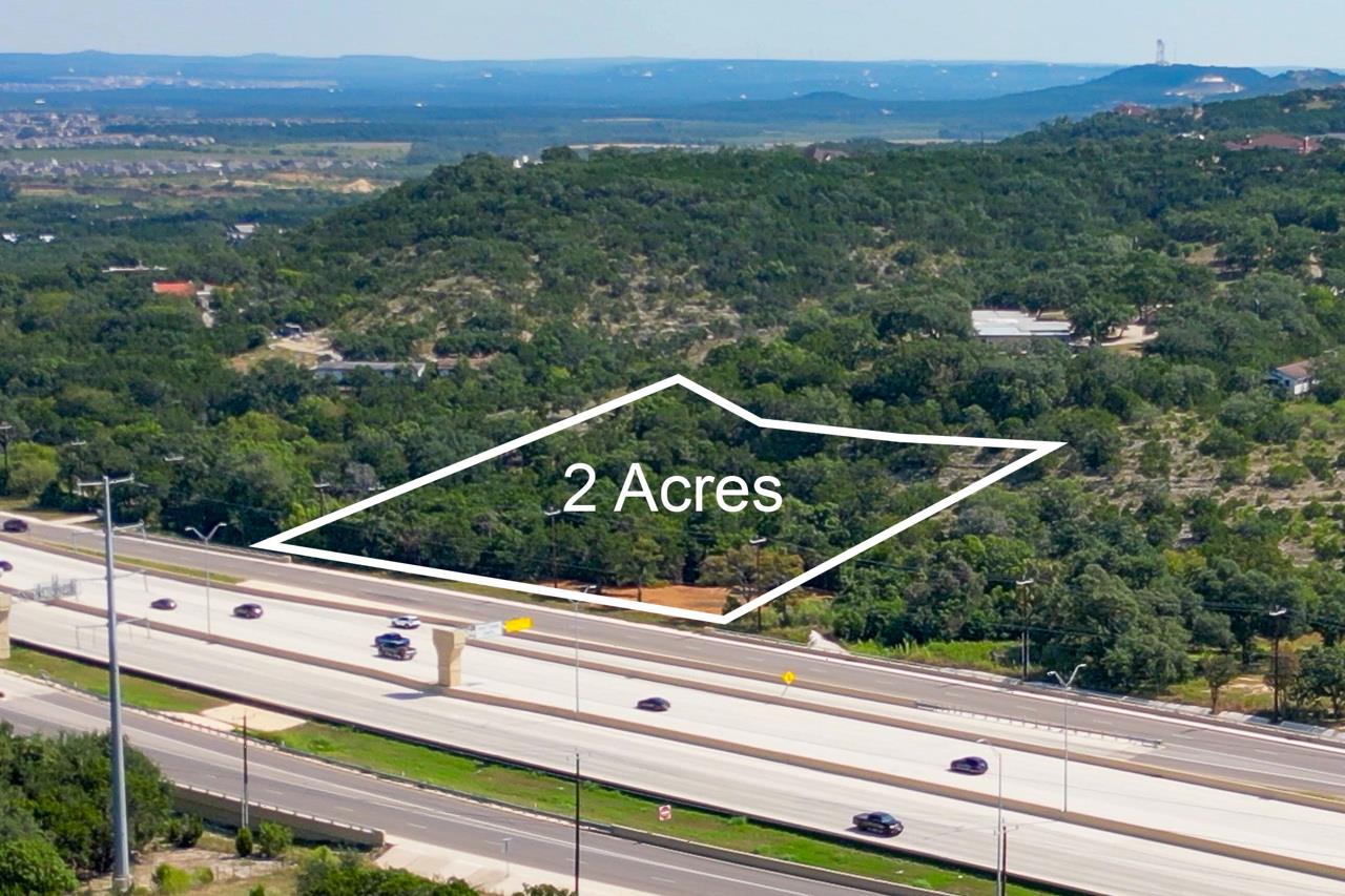 Aerial view of property and surrounding area feat