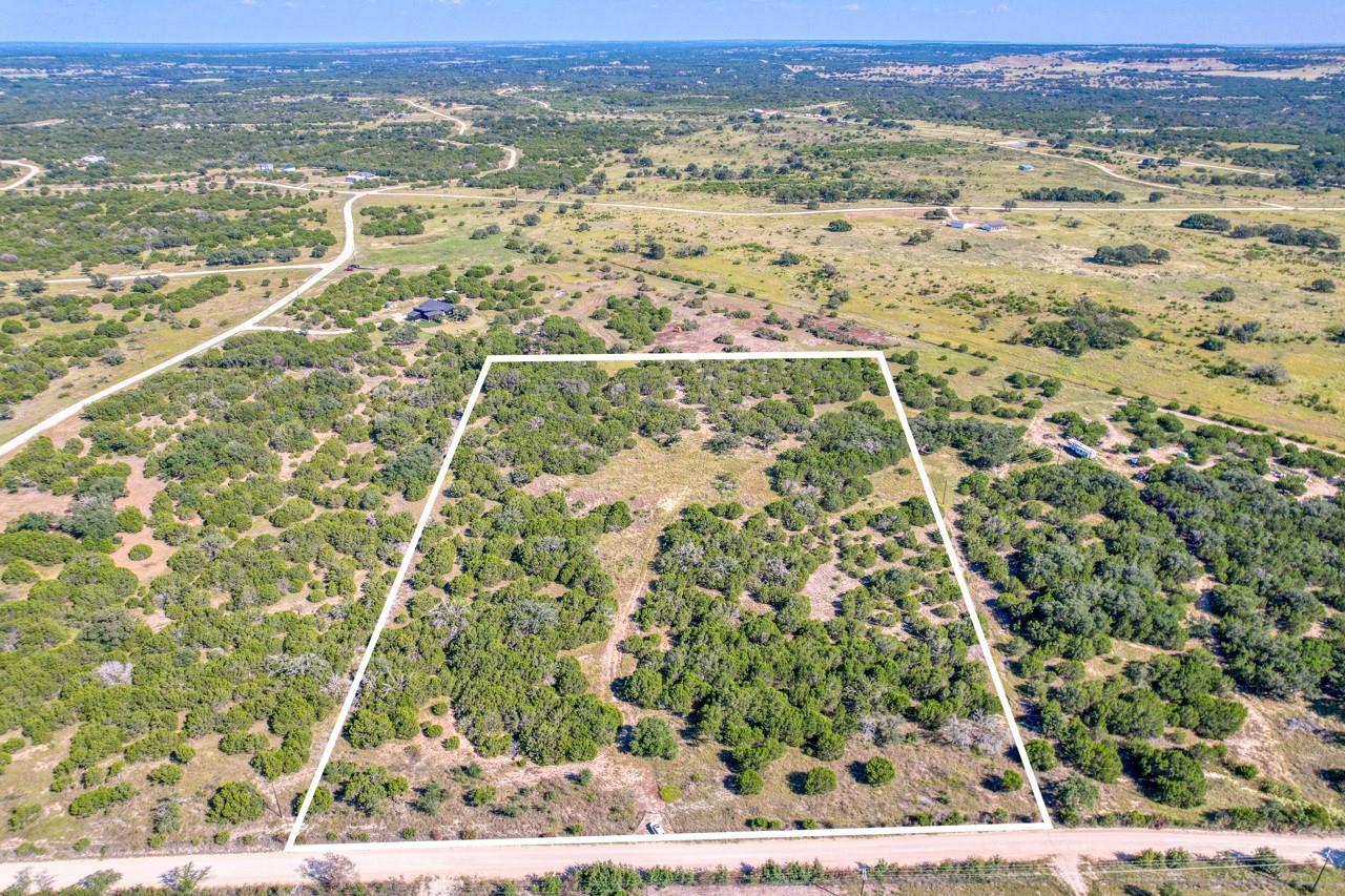 Aerial overview of property's location with prope