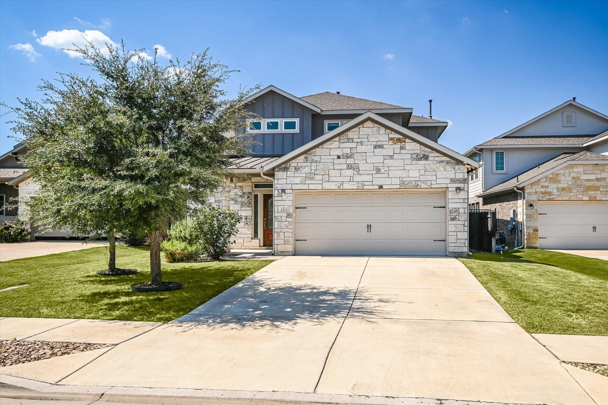 View of front of property featuring a standing se