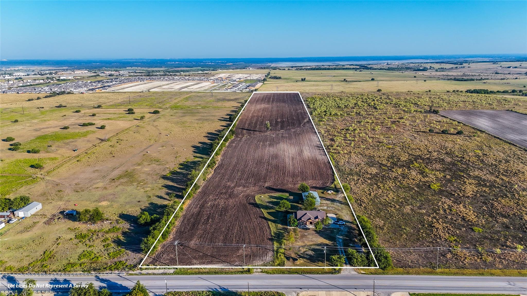 Aerial view of sparsely populated area featuring 