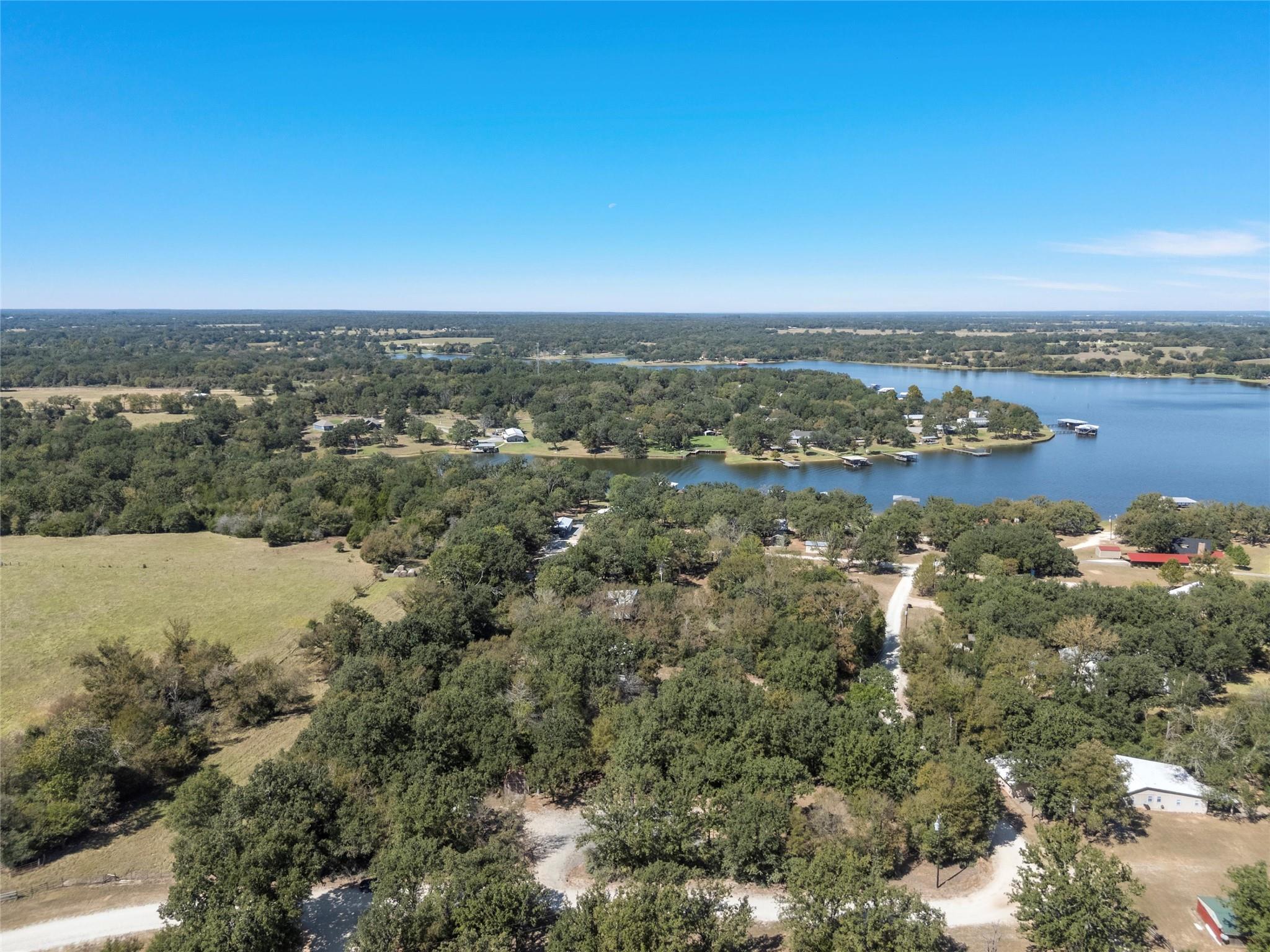 Bird's eye view of a nearby body of water and a h