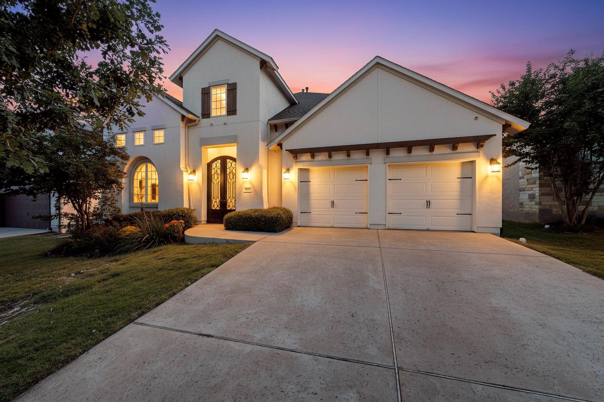 View of front of home featuring stucco siding, co