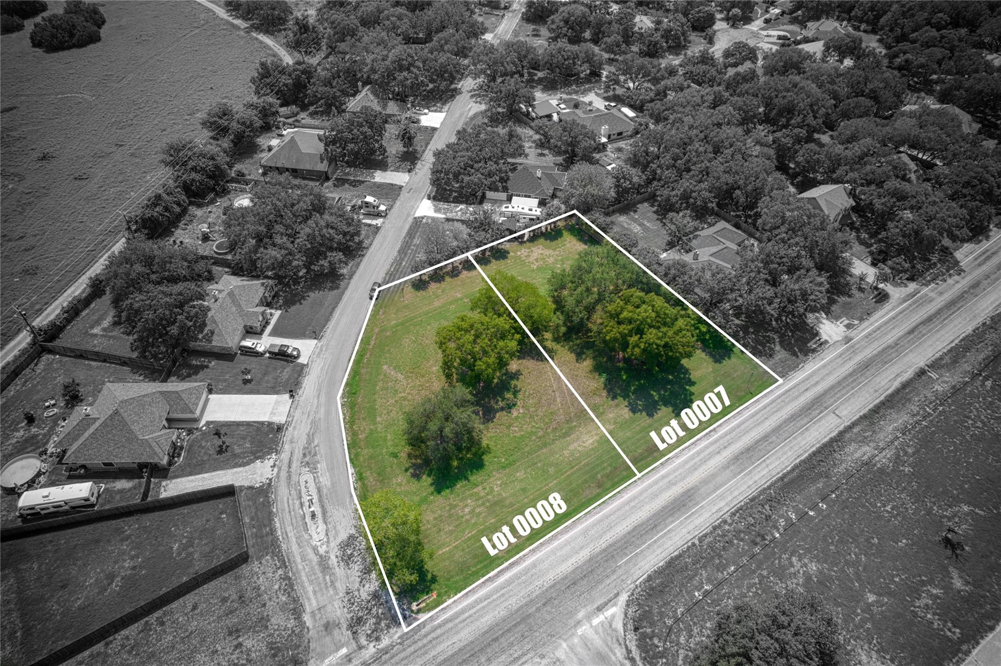 Aerial perspective of suburban area with property