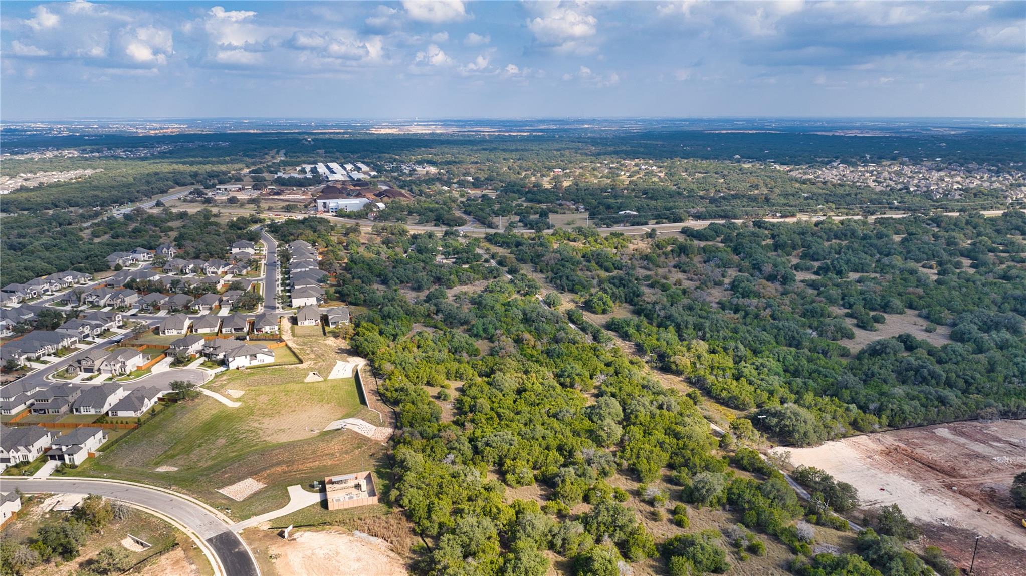 View of property location featuring nearby suburb