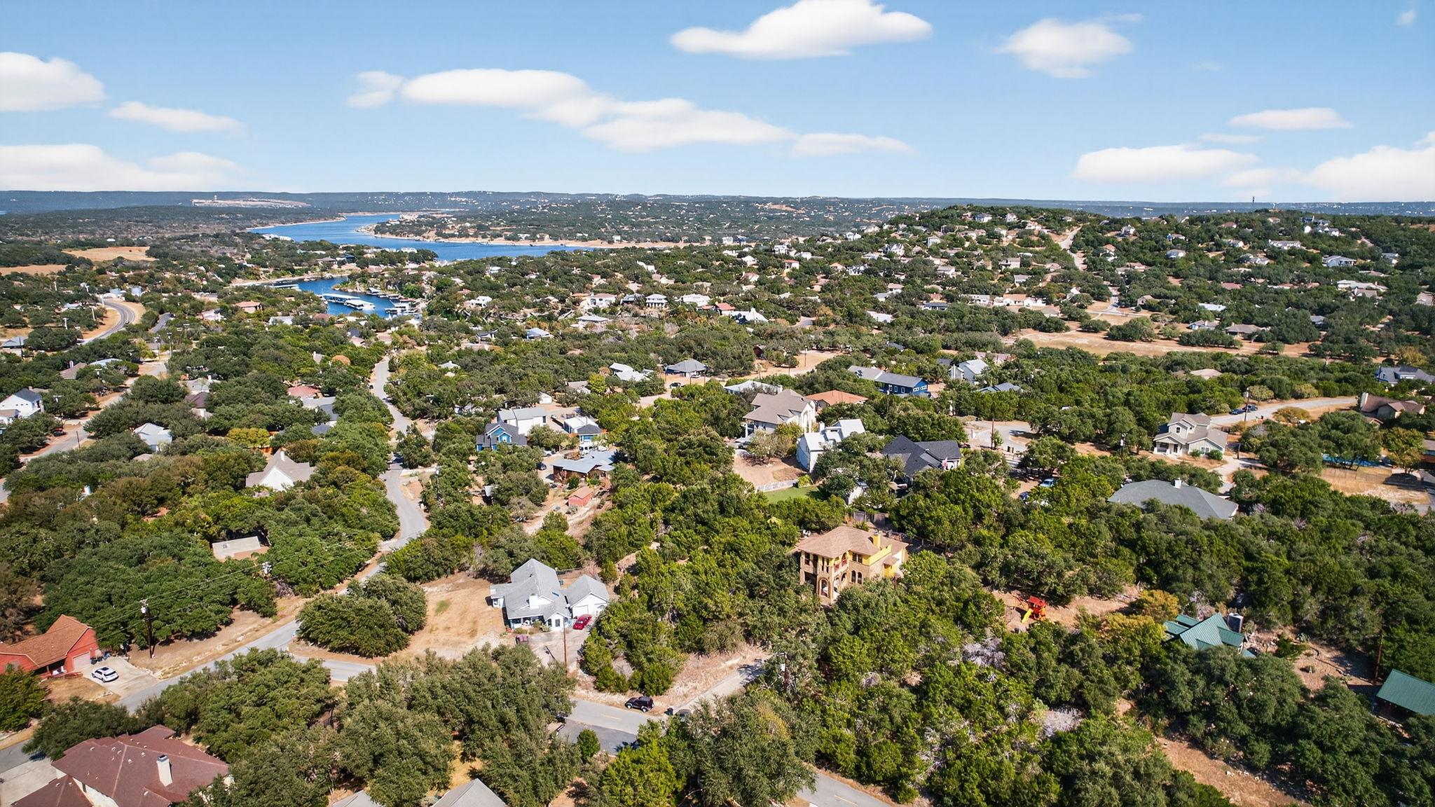 Aerial view of residential area featuring a nearb