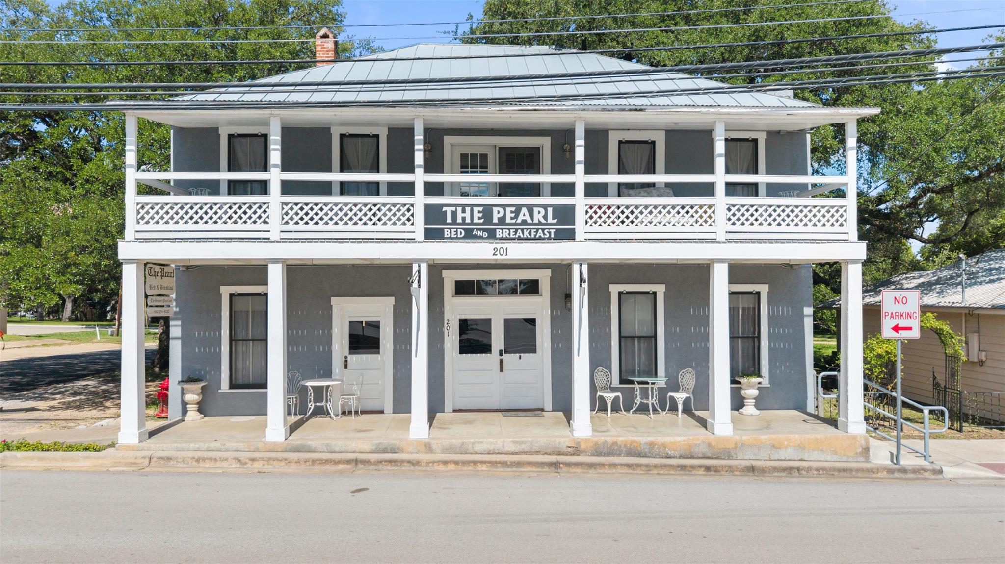 View of front of home featuring covered porch, a 