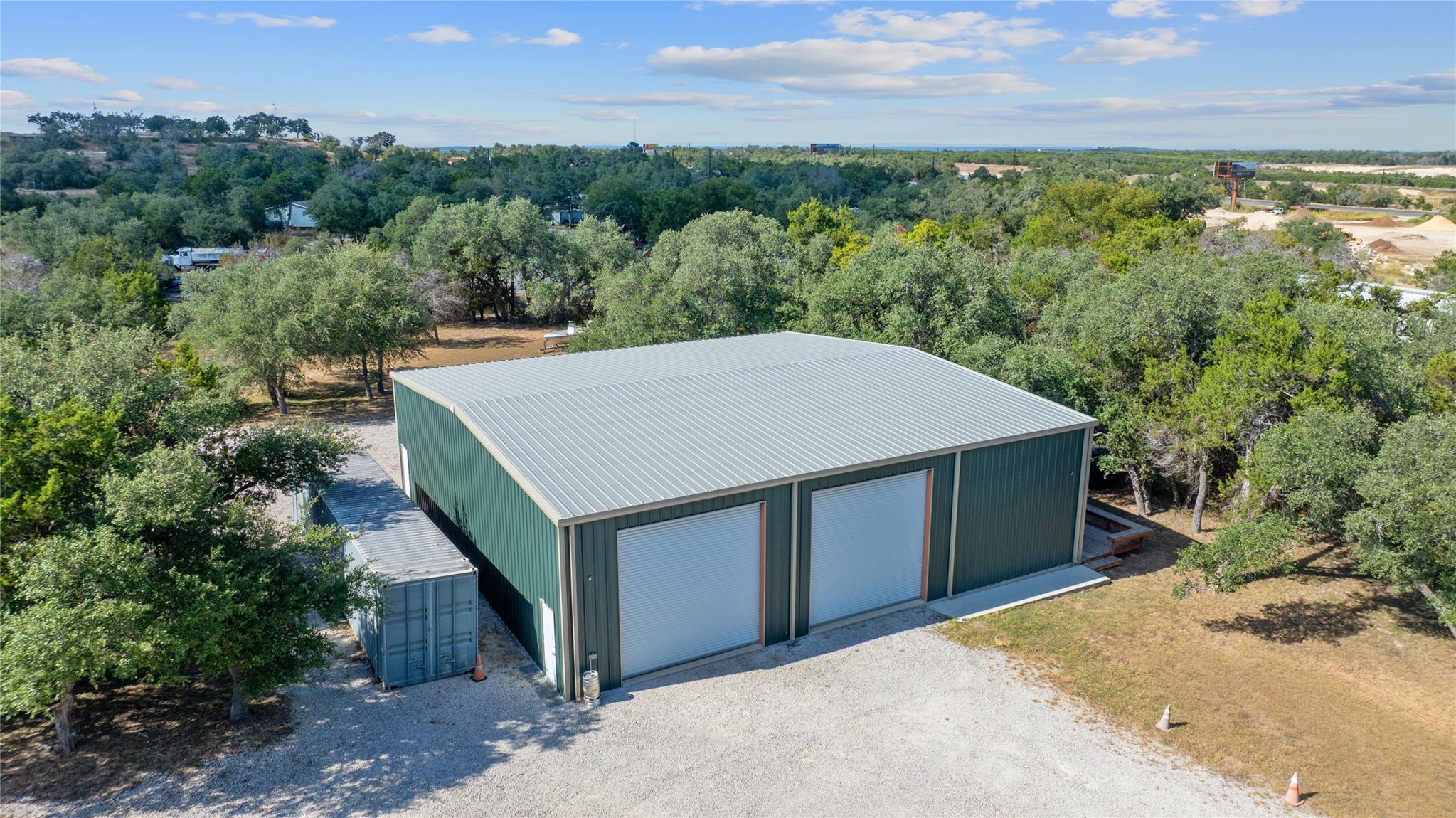 View from above of property featuring a forest